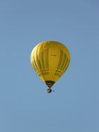 yellow hot air balloon in the sky