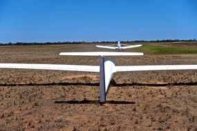 row of gliders on the field