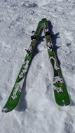 green skis on the snow