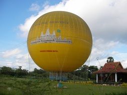 big yellow hot air balloon in Cambodia