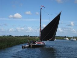 boat with black sails