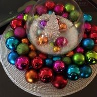 christmas balls in a glass