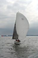 yacht on a regatta on a cloudy day