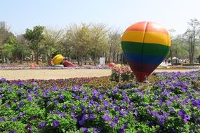 balloon on a field with flowers