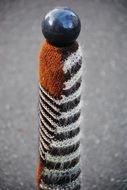 ball on a wool stick
