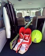 sports equipment in the trunk of a car