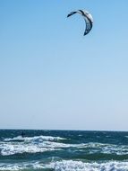 kite surfing on a wave