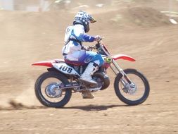motorcyclist in extreme competitions on a dirt