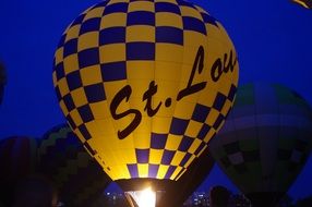 yellow-blue balloon at dusk