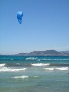 kitesurfing on the waves