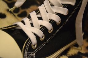 Sports shoes with white laces close-up