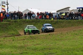 autocross cars in the mud