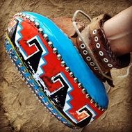 color sports glove on athlete's hand