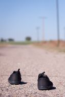 black shoes on the road