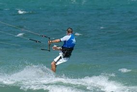 kitesurfers jump