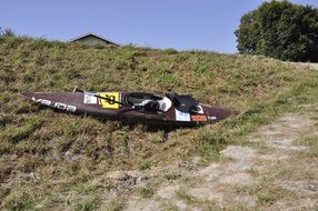 kayak laying on hill side