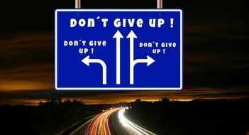 "Don't give up" road sign