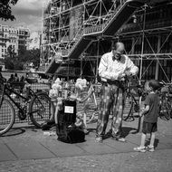 clown on a Parisian street in black and white background