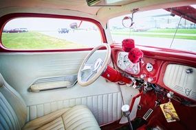 vintage car with red and white interior
