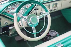 vintage car dashboard in turquoise color
