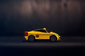 toy yellow racing Ferrari of Lego