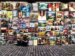 lonely guy sells his paintings