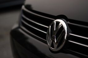 Volkswagen emblem on car hood close up
