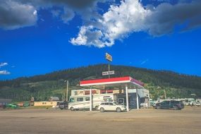 gas station on the road near the mountain