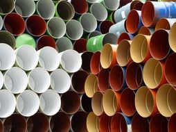 colored barrels stacked on top of each other