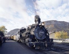 Old steam locomotive on the railroad