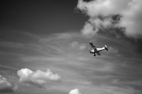 small airplane in the sky