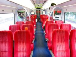 interior of a vehicle with red seats