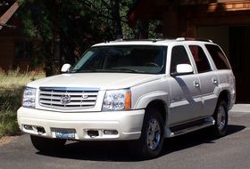 White cadillac vehicle