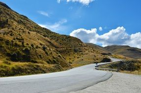 road among a picturesque landscape on a sunny day