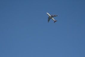 the plane in the blue sky