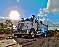 white truck on blue sky background