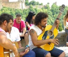 guitarist street musicians playing outside, spain