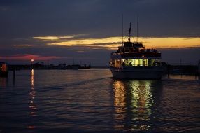 tourist boat at the sunset