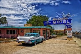 Blue Swallow motel and retro car