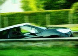 green car speeding