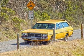 Oldtimer yellow auto in summer