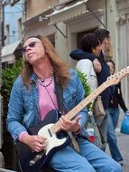 Hippie guitarist in Italy
