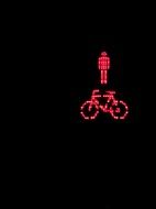 man near bike as a sign on black background