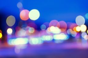 blurred photo of glowing city at night