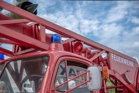 Red fire truck with the ladder