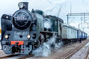 vintage locomotive on the tracks