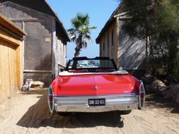 luxury oldtimer auto on sand at sea, france, st tropez