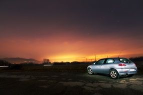 silver car at sunset