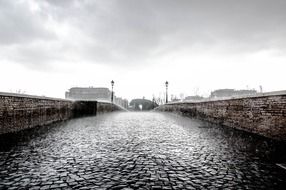 photo of stone road at rainy day