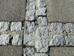 pavers with stones on the road